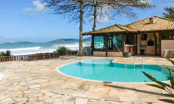 Manguinhos Condo | GERIBÁ BEACH! WONDERFUL HOUSE IN CONDOMINIUM FACING THE SEA.