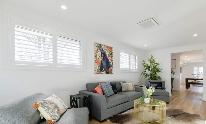 Orange House | Getaway on Curran | CBD Escape, EV Plug, Firepit