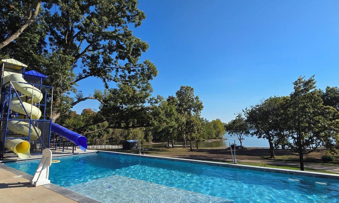 Grove House | Giant 10-bedroom lakefront home with large pool, hot tub, and dock