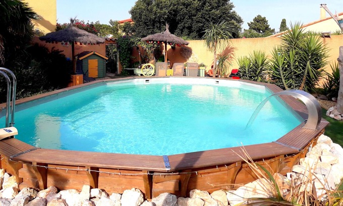 Argeles-sur-Mer Apartment | Gite saint julien in rez of garden with terrace swimming pool and games.