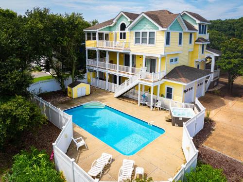Corolla House | Golf Cart Friendly Pool Game Room & Resort Perks