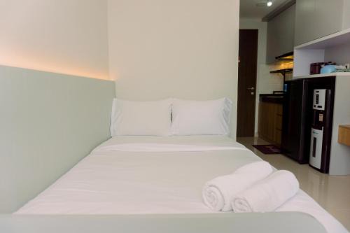 Ciputat Apartment | Good Deal and Simply Look Studio Room at Transpark Bintaro Apartment By Travelio