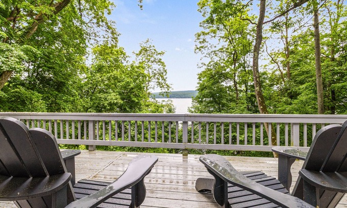 North Lake George House | Gorgeous lakeview retreat with wraparound porch, wood stove, & WiFi - dogs OK