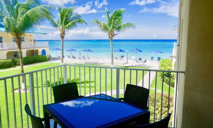 Seven Mile Beach Condo | Gorgeous Ocean Views! In the Center of 7 Mile Beach! Walk to Most Everything!