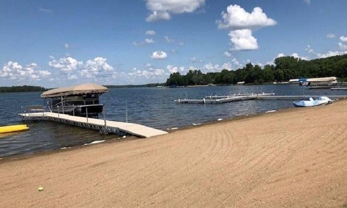 Rochert House | Gorgeous sunsets and a sugar sand beach in the heart of lakes country await you!