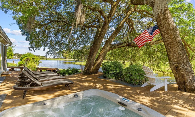 Sea Trail House | Gorgeous waterfront home with private hot tub, pool, views, deck, & fireplace