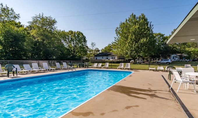 Saugatuck House | Goshorn 18 - Located in Goshorn Lake Resort - Shared pool - Lake access