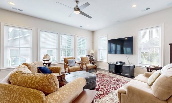 The Glade House | Grande at Canal Pointe home with pools, sports courts, & gym