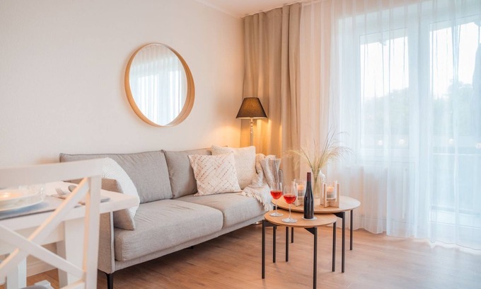 Schillig Apartment | Great apartment on the dike with balcony and private beach chair on the North Sea beach!