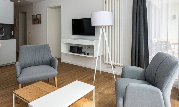 Bensersiel Apartment | Great North Sea apartment with balcony, parking, use of swimming pool & sauna -