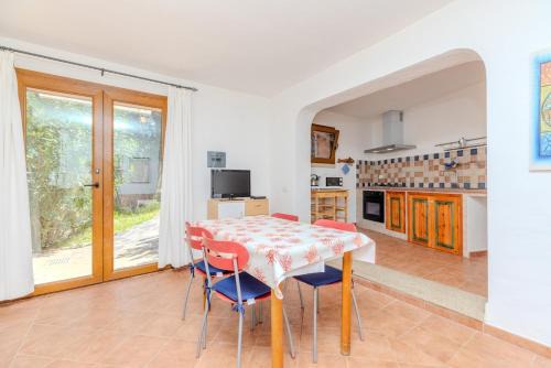 Monte Petrosu Apartment | Green Oasis - 2 Min Walk from Cala Girgolu