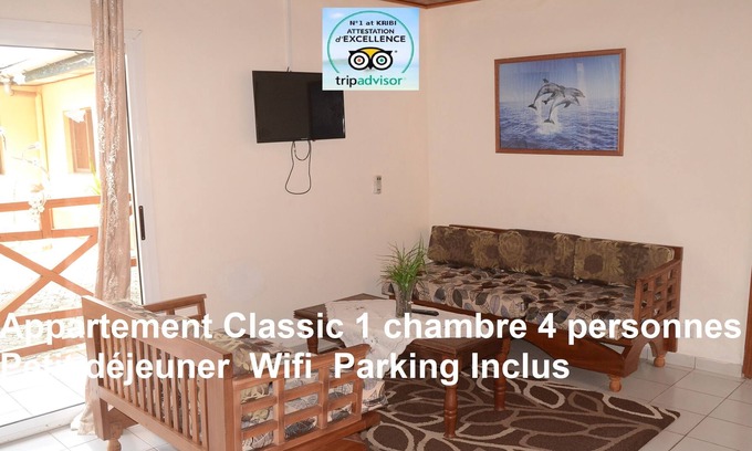 Kribi Apartment | Ground floor apartment 1 family room for 4