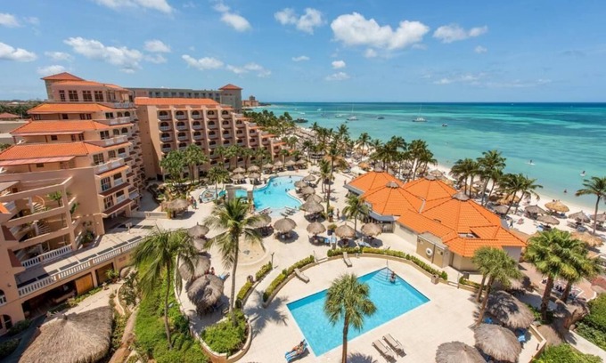 Oranjestad-West Resort | ground floor unit private veranda steps from the pool- across from the beachn