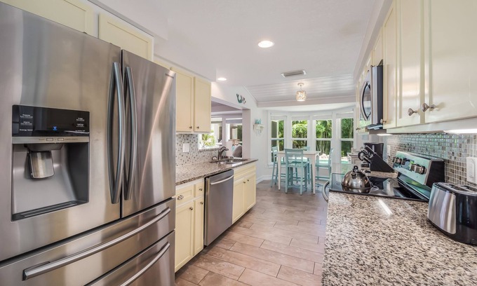 Holmes Beach House | Ground level home with pool, spa and lanai! - Coastal Breeze
