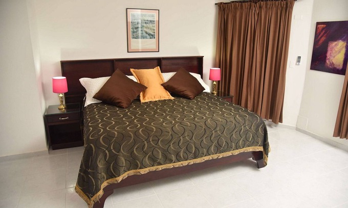 Cabarete Apartment | Groundfloor 2BD 2BTH beachfront condo with sea views, pool/AC/Wi-Fi, near all