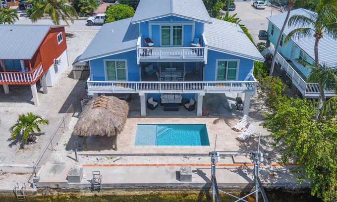 Cutthroat Harbor Estates House | Group Therapy Waterfront Keys Home – Pool, Tiki Hut, Dockage, & Monthly Rentals