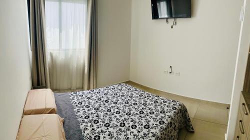 Centro House | Habitación con cama matrimonial