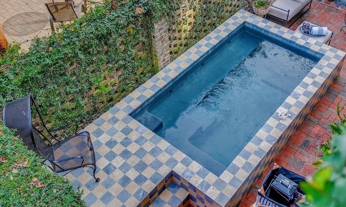 Historic Downtown Savannah House | Heated Private Garden Pool Steps Off Jones Street by Lucky Savannah