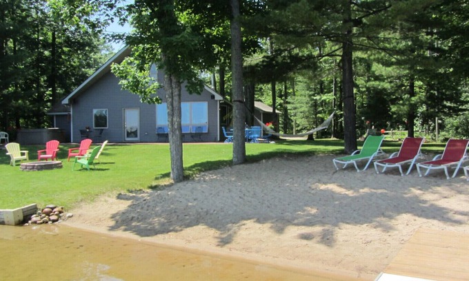 Interlochen Cottage | Hidden Gem Cottage on Bass Lake with Hot Tub - Summer Memories Last Forever