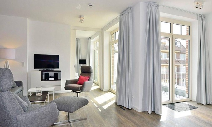 Wangerooge Apartment | High-quality apartment on the North Sea beach with sunny south-facing balconies and beach chair