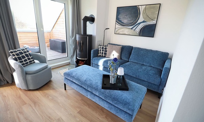 Tossens Apartment | HimmelFrei - Holiday apartment with water view. Sauna. Two roof terraces.