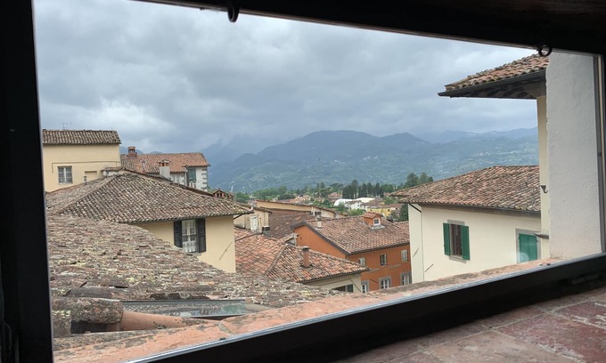 Mologno Apartment | Historic Centre Charming Apartment with Terrace and BBQ