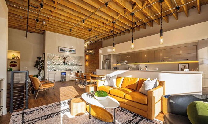 Ogden Apartment | Historic Elegance with Balcony Downtown View