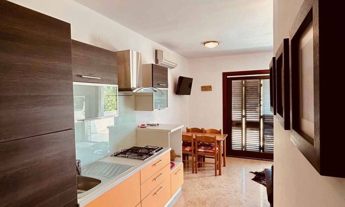 Klimno Apartment | Holiday apartment on the ground floor, air-conditioned, with a large beautiful terrace and sea views