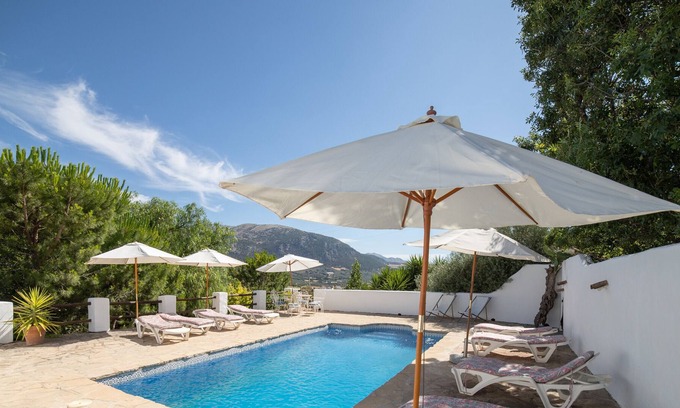Villanueva del Trabuco Apartment | Holiday home "Cortijo Los Lobos Mountain Retreat" with communal pool and WiFi