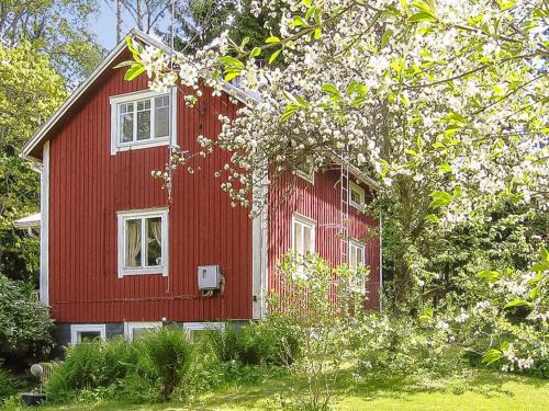 Kimito Island House | Holiday Home Archipelago red cottage by Interhome
