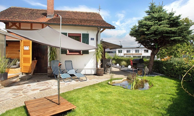 Friedrichshafen House | Holiday Home 'Die Bahnstation' with Private Terrace, Private Garden and Wi-Fi