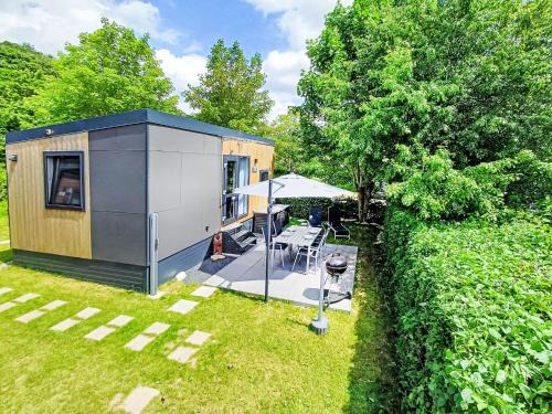 Wemding House | Holiday Home Tiny Haus am Waldsee by Interhome