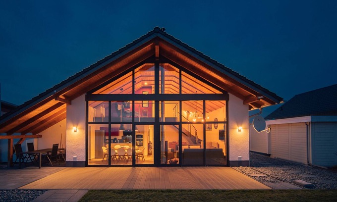 Lobnitz House | Holiday house Chalet 100 with private beach, sauna and fireplace!
