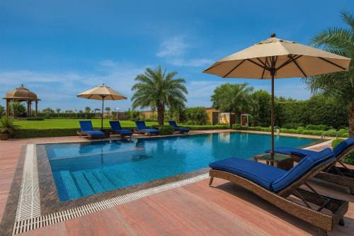 Harda Hotel | Holiday In , Vrindavan #Big Swimming Pool #luxury Rooms # Lush Garden # Family Friendly # Kids Play Zone # Calm & Spiritual Vibes # Away From City Hustle# By elegance group#