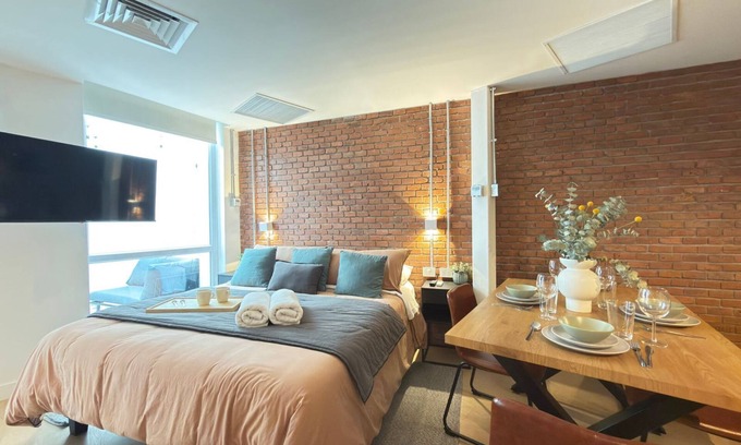Lastarria Apartment | HOM I Loft Moderno terraza en Lastarria Planta 1