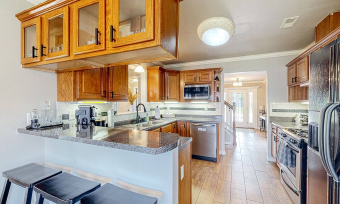 Bentonville House | Home in great location with fenced yard, fireplace, bikes, grill, patio, dogs OK