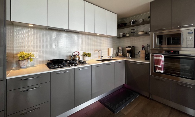 Connaught Condo | Home in the Sky 2 Bed 2 Bath Sunny Corner Unit