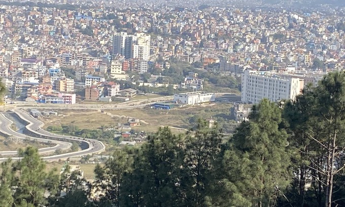 Kirtipur House | Home is located on the side of a mountain near a famous Buddhist monastery. n