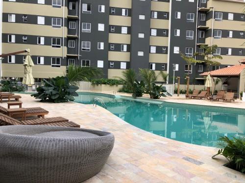 Estufa II Apartment | Home Resort Palmeiras II - proximo Praia Grande