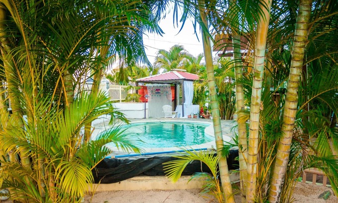Pereybere Apartment | Homerez - Appartement 600 m away from the beach for 4 ppl. with shared pool