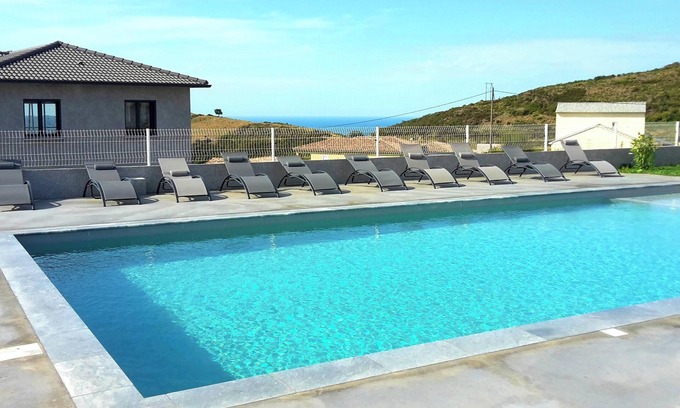 Olmeta-di-Tuda Apartment | Homerez - Charming Apartment in Olmeta di Tuda with Shared Pool