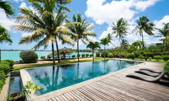 Pointe aux Canonniers Villa | Homerez - Villa for 8 ppl. with shared pool at Pointe aux Cannoniers, Grand Baie