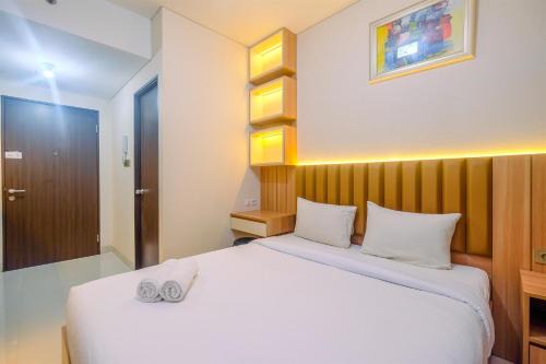 Depok Apartment | Homey and Stylish Studio Room at Transpark Cibubur Apartment By Travelio