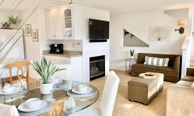 Downtown Condo | Host By Owner! Family Size Condo! Walk to the Beach & Downtown! Two-car garage!