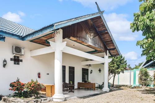 Kalimantan Hotel | Hotel O Wisma Pundu Syariah Near Kantor Camat Kota Besi