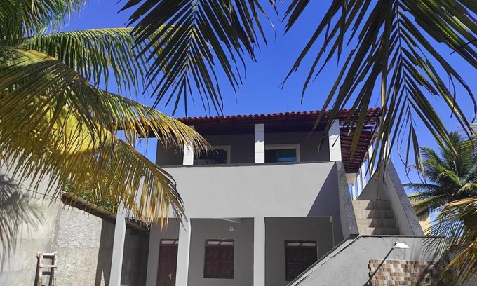Porto de Sauipe House | house of peace meeting river and sea