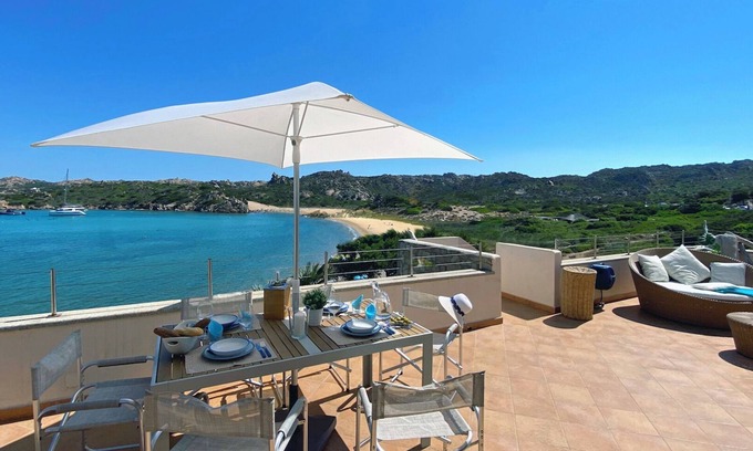 La Maddalena Apartment | House on the beach of Monti d'à Rena with terrace, garden and wi-fi connection