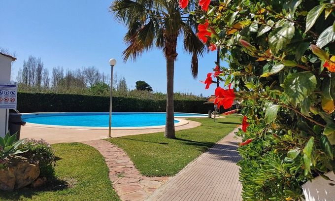 Molinell Ski Chalet | Ibiza-style vacation home with terrace right on the beach. Great pools.