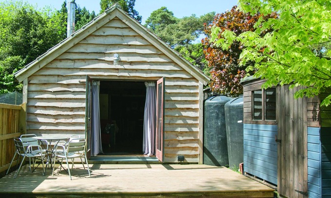 Wareham Cabin | Idyllic Log Cabin with Log-fired Hot Tub nestled in a Forest Clearing