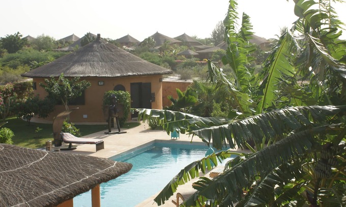 Nianing Villa | In an idyllic setting, refined interior, ethnic chic and industrial style